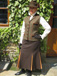 J 34 single breasted gillet Brown velvet trim with desert gold piping Shown with toning skirt.jpg